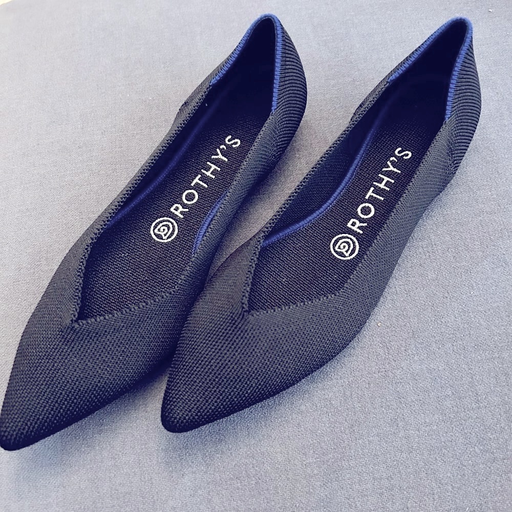 NWOT, never worn Rothy's "The Point", in black. 7.5